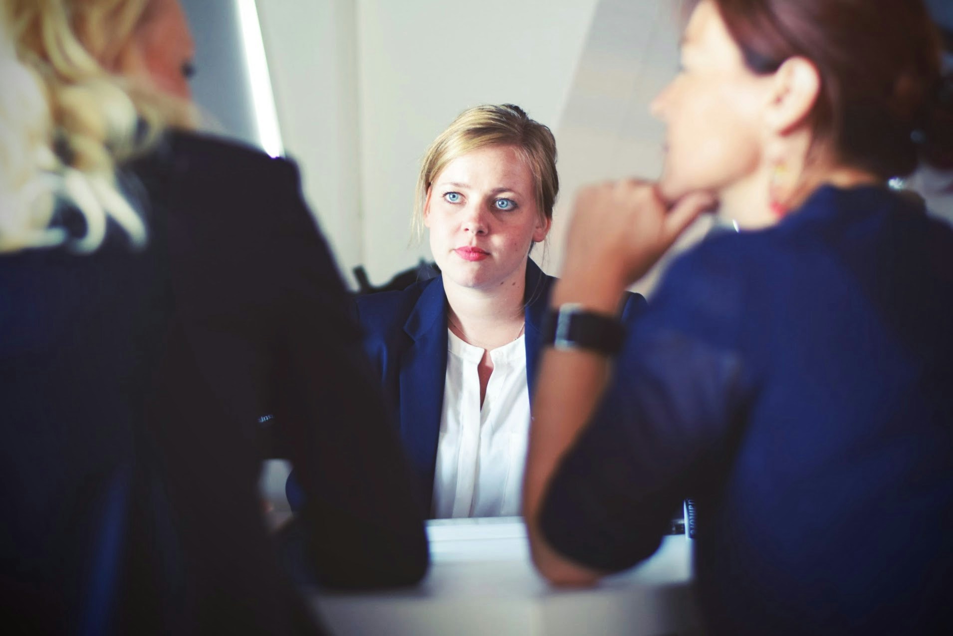 People in a focused, real-world conversation